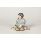 ROYAL COPENHAGEN 'GRONLAND' PORCELAIN FIGURE, modelled as a young girl, seated with a posy of