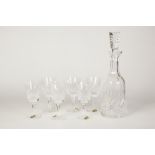 WATERFORD CUT GLASS DECANTER AND STOPPER AND A SET OF SIX MATCHING WINE GLASSES, the decanter 13" (