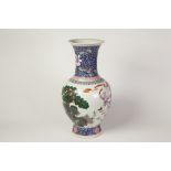 TWENTIETH CENTURY CHINESE ENAMELLED PORCELAIN VASE, of baluster form with slightly waisted neck,