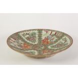 LATE 19th CENTURY CHINESE CANTON DECORATED SHALLOW DISH with figural and floriated panels in famille