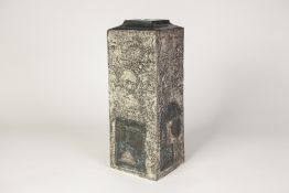 TROIKA, CORNWALL, TALL RECTANGULAR MOULDED POTTERY VASE, painted in blue with abstract and geometric