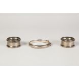 PAIR SILVER NAPKIN RINGS with bead edge and engine turned, Chester 1944 and a HOLLOW SILVER HINGED