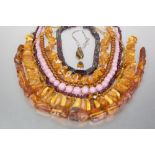 *THREE ROUGH COPAL AMBER NECKLACES, 187g gross, A SILVER FRAMED AMBER PENDANT, A SILVER MOUNTED