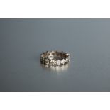 AN ETERNITY RING, claw set with sixteen round brilliant cut diamonds, each approx 1/4ct approx,