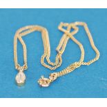 9k GOLD FINE CHAIN NECKLACE, 16" long, 3.4gms and the PENDANT, collet set with a tear shaped
