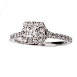 HEARTS ON FIRE 'TRANSEND' PLATINUM AND DIAMOND SQUARE CLUSTER RING, with centre dream cut square