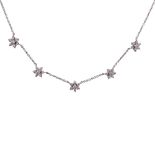 HEARTS ON FIRE 'Garden Flower' 18ct WHITE GOLD AND DIAMOND NECKLACE, with five daisy clusters,