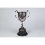 AN ELECTROPLATED 'DUNHAM FOREST GOLF CLUB STEM CUP 1980 RUNNER UP TWO HANDLED TROPHY on bakelite