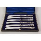 A CASED SET OF SIX SILVER HANDLED TEA KNIVES, Sheffield 1936