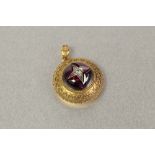 VICTORIAN ETRUSCAN REVIVAL (UNMARKED) GOLD, GARNET AND DIAMOND DOMED CIRCULAR PENDANT, the carbuncle