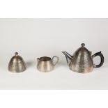 A PROBABLY POST WAR ELECTROPLATED THREE PIECE TEA SERVICE, of unusual horizontally ribbed honey-skep