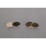 PAIR OF 9ct GOLD DOUBLE OVAL CUFF LINKS, with engine turned tops, in associated case, 4.7gms (2)