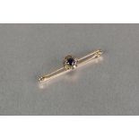 15ct GOLD SAFETY PIN BROOCH with centre cluster of circular sapphire and surround of nine old cut