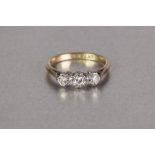 18ct GOLD AND PLATINUM RING, with three small diamonds in deceptive settings, 3gms, ring size 'M'