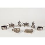 AN EARLY TWENTIETH CENTURY SILVER CONDIMENT SET OF A PAIR OF MUSTARD POTS with blue glass liners,