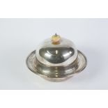 AN EDWARDIAN SILVER CRESTED MUFFIN DISH with liner and domed cover, with ivory knop, Sheffield