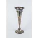 GEO V SILVER TRUMPET VASE of panelled tapering form with broad rim and stepped circular foot , 9" (