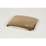 a 9ct GOLD ENGINE TURNED CIGARETTE CASE, Birmingham 1928, 116gms