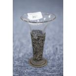 A LATE VICTORIAN/ EDWARDIAN SILVER STAMPED AND PIERCED TAPERED RECEIVER with clear glass trumpet