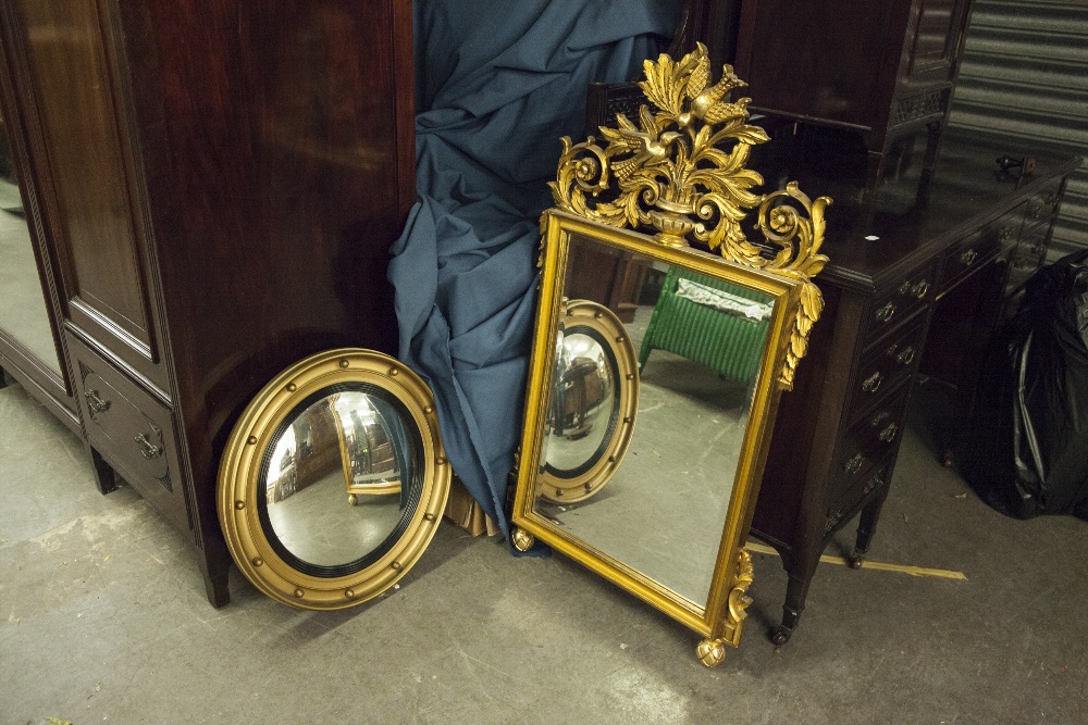 MODERN OBLONG BEVELLED EDGE WALL MIRROR IN GILT FRAME WITH ORNATE CLASSICAL VASE AND FOLIATE