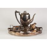 AN INTER-WAR YEARS ELECTROPLATED DEMI-GADROONED COFFEE POT, with blackwood handle and knop to cover,
