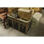 A METAL BOUND CABIN TRUNK AND A METAL DOME TOP TRUNK