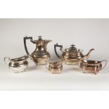 AN INTER-WAR YEARS THREE PIECE ELECTROPLATED TEA SERVICE, TOGETHER WITH A SIMILAR TWO HANDLED