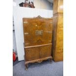 REPRODUCTION BURR WALNUTWOOD AND MAHOGANY COCKTAIL CABINET, ELABORATELY PIERCED BRASS LOCK PLATE AND