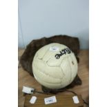 A MINK DYED BROWN MUSQUASH FUR STOLE AND A MITRE SIZE 5 FOOTBALL