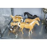 A COLLECTION OF TEN BESWICK POTTERY MODELS OF HORSES