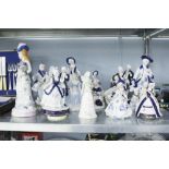 A LARGE QUANTITY OF CERAMIC FIGURES (15 IN TOTAL)