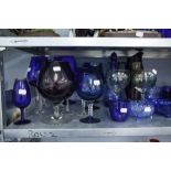 A QUANTITY OF COLOURED GLASS, VASES, BOWLS ETC...