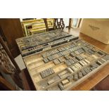 TWO WOOD TRAYS OF TYPESETTERS WOODEN PRINTING BLOCKS