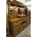 A VICTORIAN WALNUTWOOD AND MAHOGANY MIRROR BACK SIDEBOARD, THE ASSOCIATED RAISED BACK WITH SHAPED