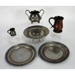 VICTORIAN EMBOSSED ELECTROPLATE TWO HANDLE SAUCER raised on four pierced tub feet and A VICTORIAN