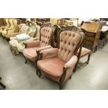 TWO MAHOGANY FRAMED ARMCHAIRS WITH BUTTON BACK UPHOLSTERY