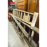 TWO LARGE 'A' FRAME WOODEN STEP LADDERS, AND A SMALLER SET OF WOODEN STEP LADDERS (3)