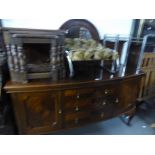 EARLY TWENTIETH CENTURY BOW FRONTED MAHOGANY MIRROR BACK SIDEBOARD, WITH QUARTER CUT CUPBOARD