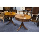 TWO REPRODUCTION FLAME MAHOGANY AND MAHOGANY DRUM TABLE, SIX DRAWERS ON OUTSWEPT SUPPORTS