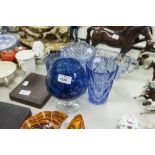 A COLLECTION OF BLUE CUT GLASS TO INCLUDE; A VASE, A TRUMPET VASE, A BOTTLE COASTER, A TWO HANDLED