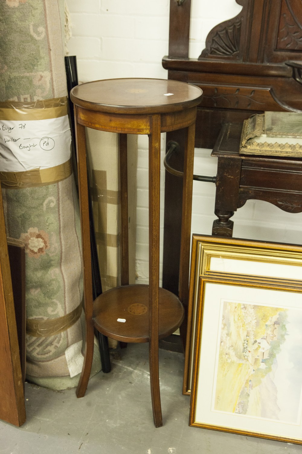 AN INLAID MAHOGANY TWO TIER PLANT STAND, WITH FLORAL INLAY AND A SMALL CONTINENTAL EMBOSSED BRASS