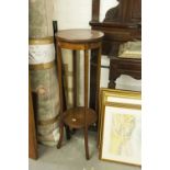 AN INLAID MAHOGANY TWO TIER PLANT STAND, WITH FLORAL INLAY AND A SMALL CONTINENTAL EMBOSSED BRASS