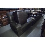 LOUNGE SUITE OF THREE PIECES COVERED IN DARK BROWN HIDE, VIZ A THREE SEATER SETTEE, A TWO SEATER