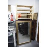 A LARGE RECTANGULAR WALL MIRROR, IN LIGHT WOOD FRAME AND A PINE SHOE RACK
