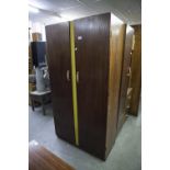 A BEDSIDE CHEST OF THREE DRAWERS AND TWO MATCHING SMALL WARDROBES