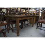 REPRODUCTION FLAMED MAHOGANY DRAW LEAF DINING TABLE ON SQUARE TAPERED LEGS