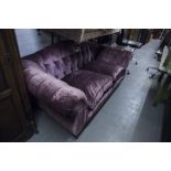 LIBERTY LONDON SOFA UPHOLSTERED IN PURPLE VELVET WITH BUTTON BACK AND ARMS, STUFF OVER SEAT