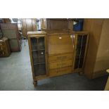 AN OAK SIDE-BY-SIDE BUREAU BOOKCASE