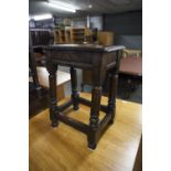 A LATE NINETEENTH CENTURY OAK JOINT STOOL