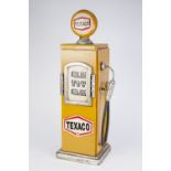 PAINTED WOOD SMALL MODEL OF A BYGONE TEXACO PETROL PUMP the front hinge opening to reveal useful